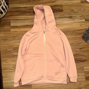 Pink zip up jacket. Large sized.